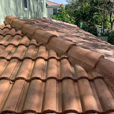 Roof-Soft-Washing-in-Palm-Beach-Gardens-FL-Tile-Roof-Cleaning-Before-After 1