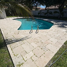 Travertine-Pool-Deck-Cleaning-Polymeric-Sand-Joint-Restoration-in-North-Palm-Beach-FL 6